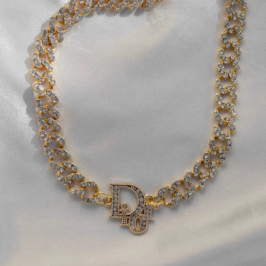 Dior Logo Pendant Crystal Strass Choker – Reluxe Vintage Dior Logo Pendant Crystal Strass Choker – Reluxe Vintage