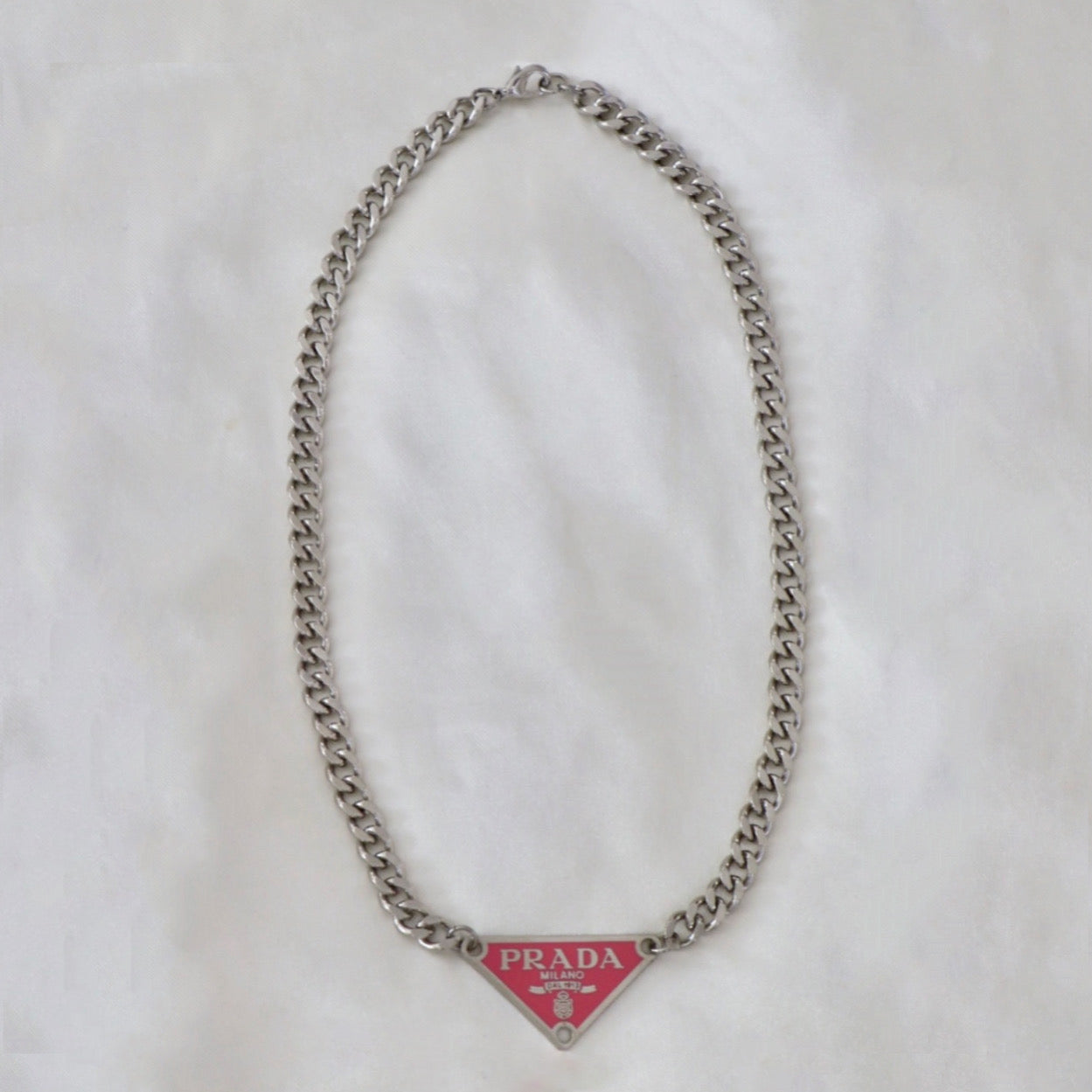 Prada Enamelled metal necklace for Women - Black in UAE | Level Shoes
